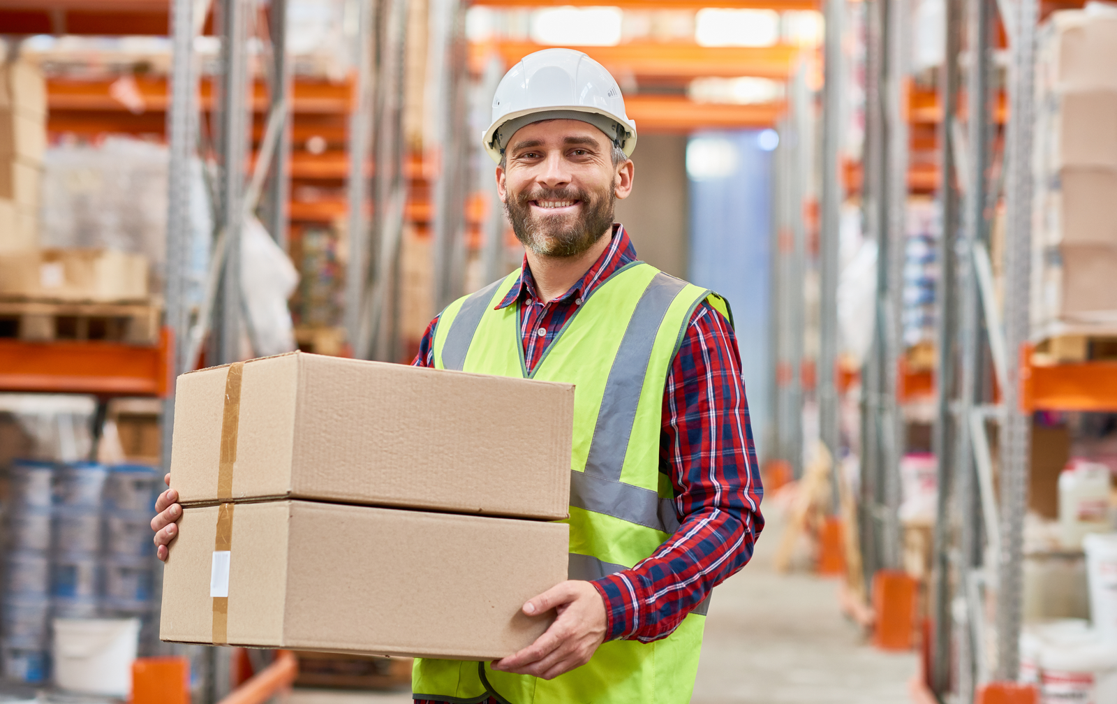 storage worker holding storage box
